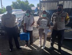 Personil Polres Bitung Kawal Pemberangkatan Vaksin dari Instalasi Farmasi Obat